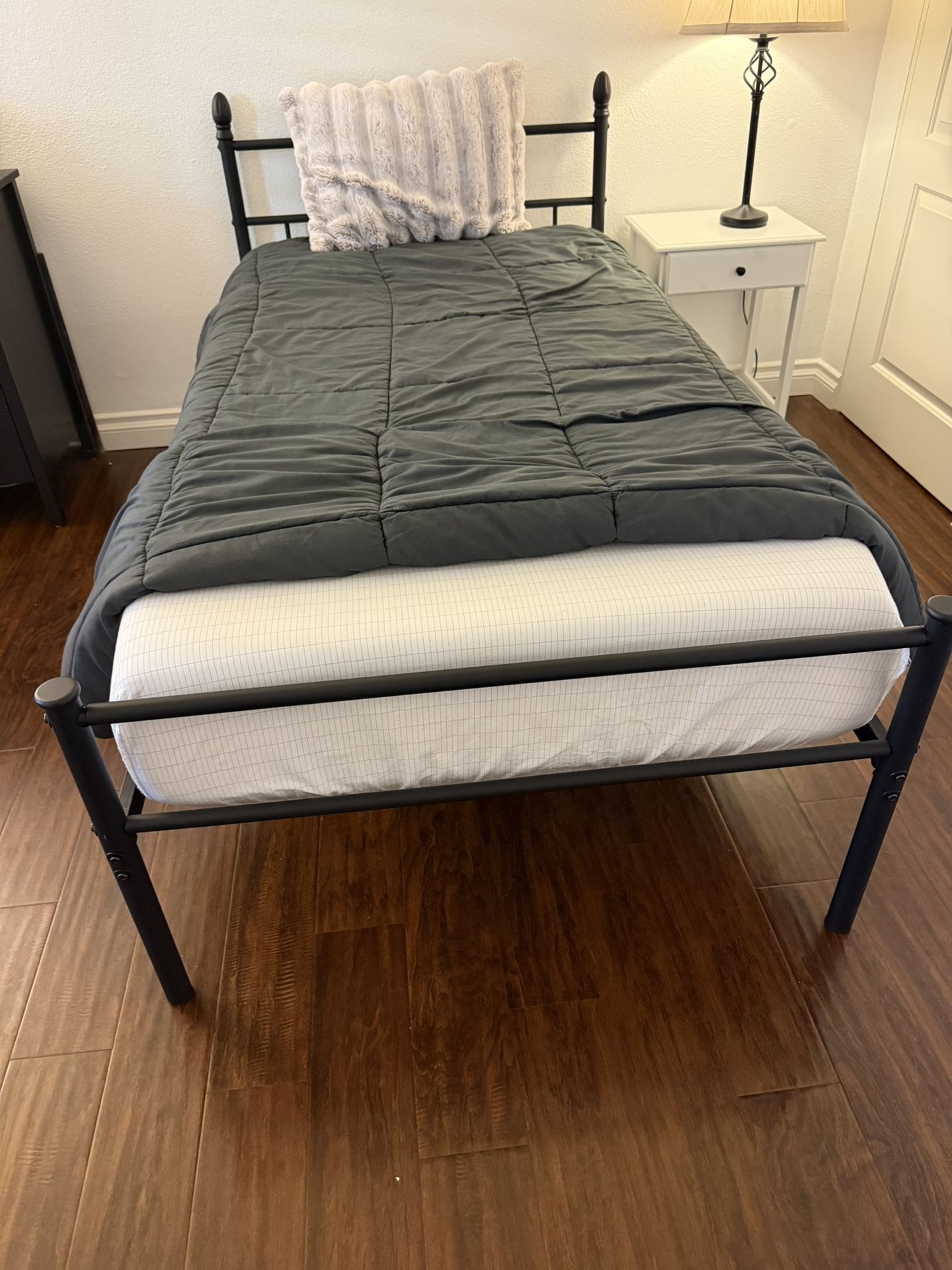 Black Twin Bed-frame With High-Quality Mattress.