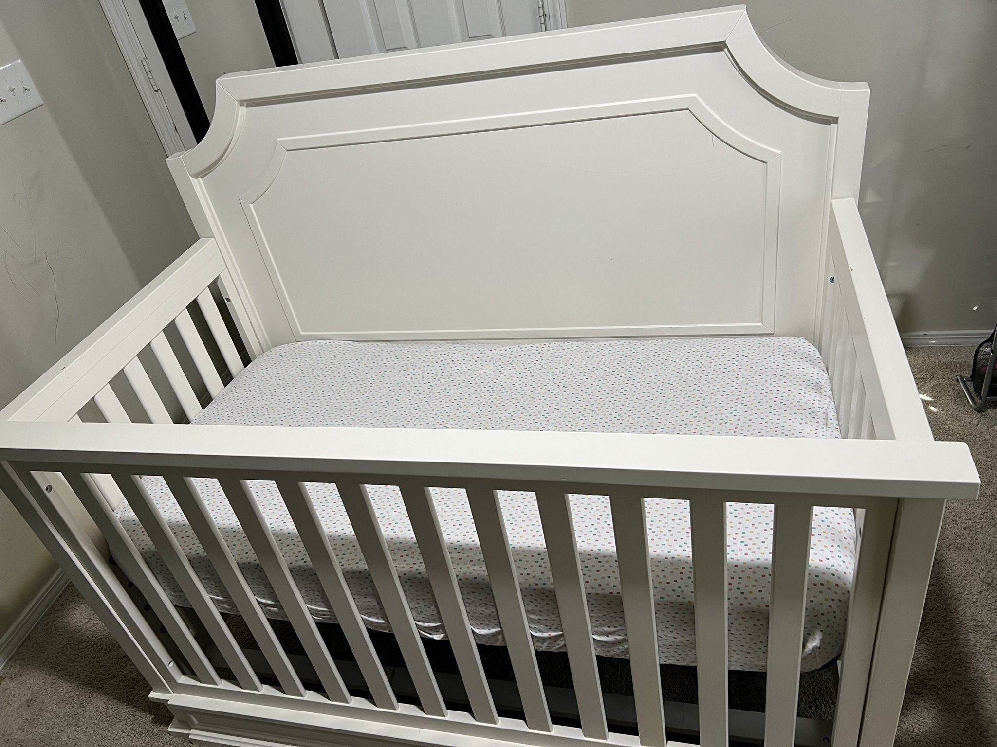 white crib and changing table, with mattress included