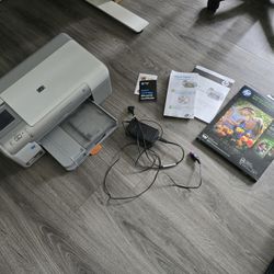 Photo printer with paper