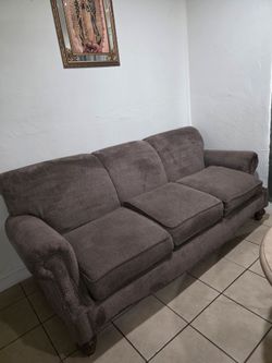 Brown clothed sofa