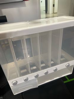 Grain storage dispenser