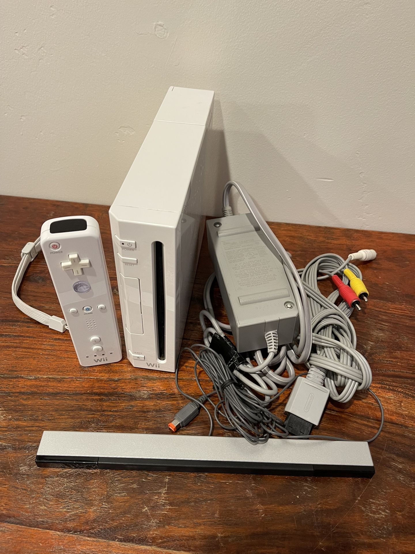 Wii Console Complete Set (Console, Power Supply Brick, Sensor Bar, AV Cord, Wiimote) for Sale in