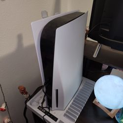 PS5 And Controller.