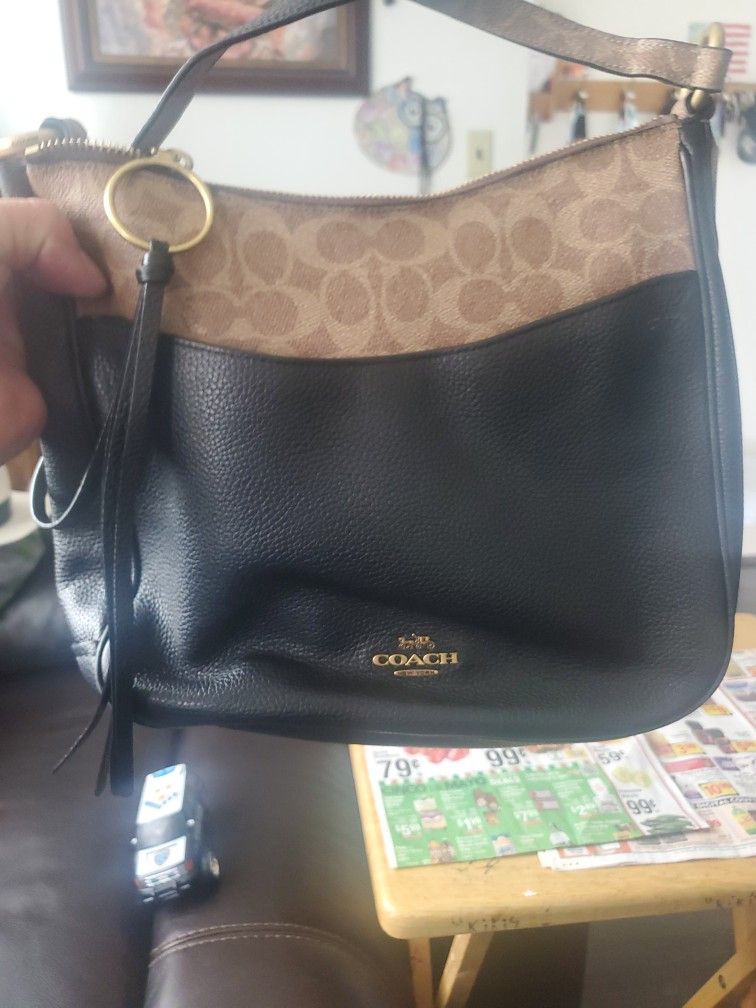 Bolsa Coach.muy Varata.