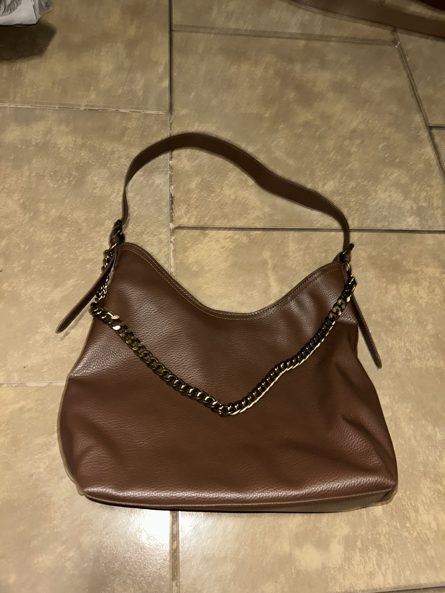 Brown Purse With Gold Chain Attached