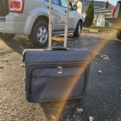 Blue dockers rolling suitcase