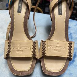 Louis Vuitton, beige wood platform women’s