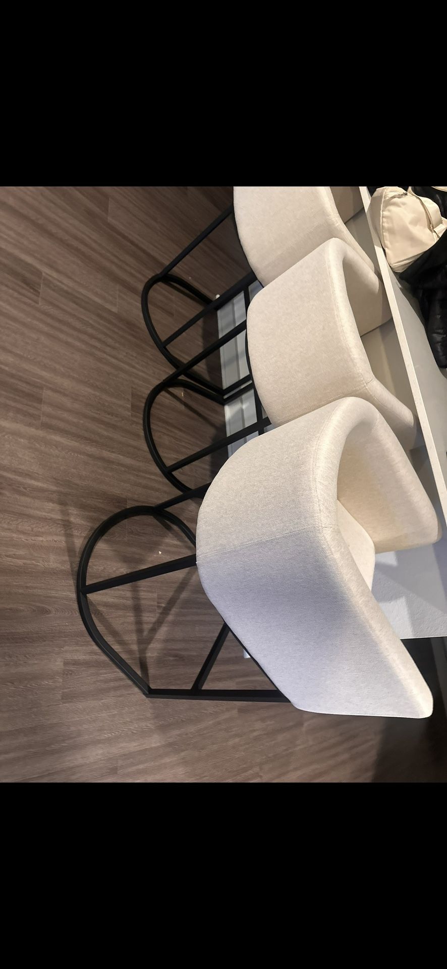 Three Beige Modern Bar Stools