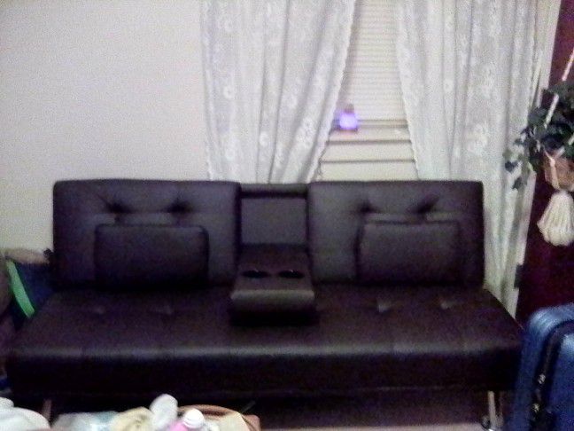 Brown leather Couch/Futon
