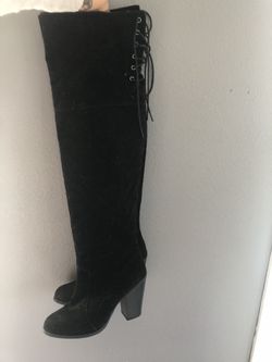 Tight high boots