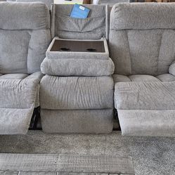 Couch sofa with two recliners and drop down table with cup holders