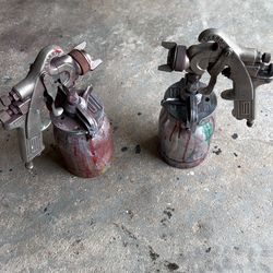 Two used sharpe spray guns