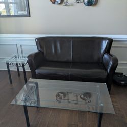 Loveseat and Glass And Metal Tables