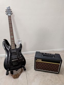 Schecter Damien Elite 6 electric guitar and Vox Pathfinder 10 amplifier