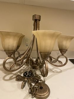 1 chandelier and two bathroom light fixtures