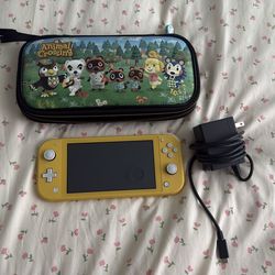 Nintendo Switch Lite w/ Case, Animal Crossing, and Charger Included