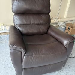Living Spaces Power Reclining Leather sofa- like New (Price Lowered)
