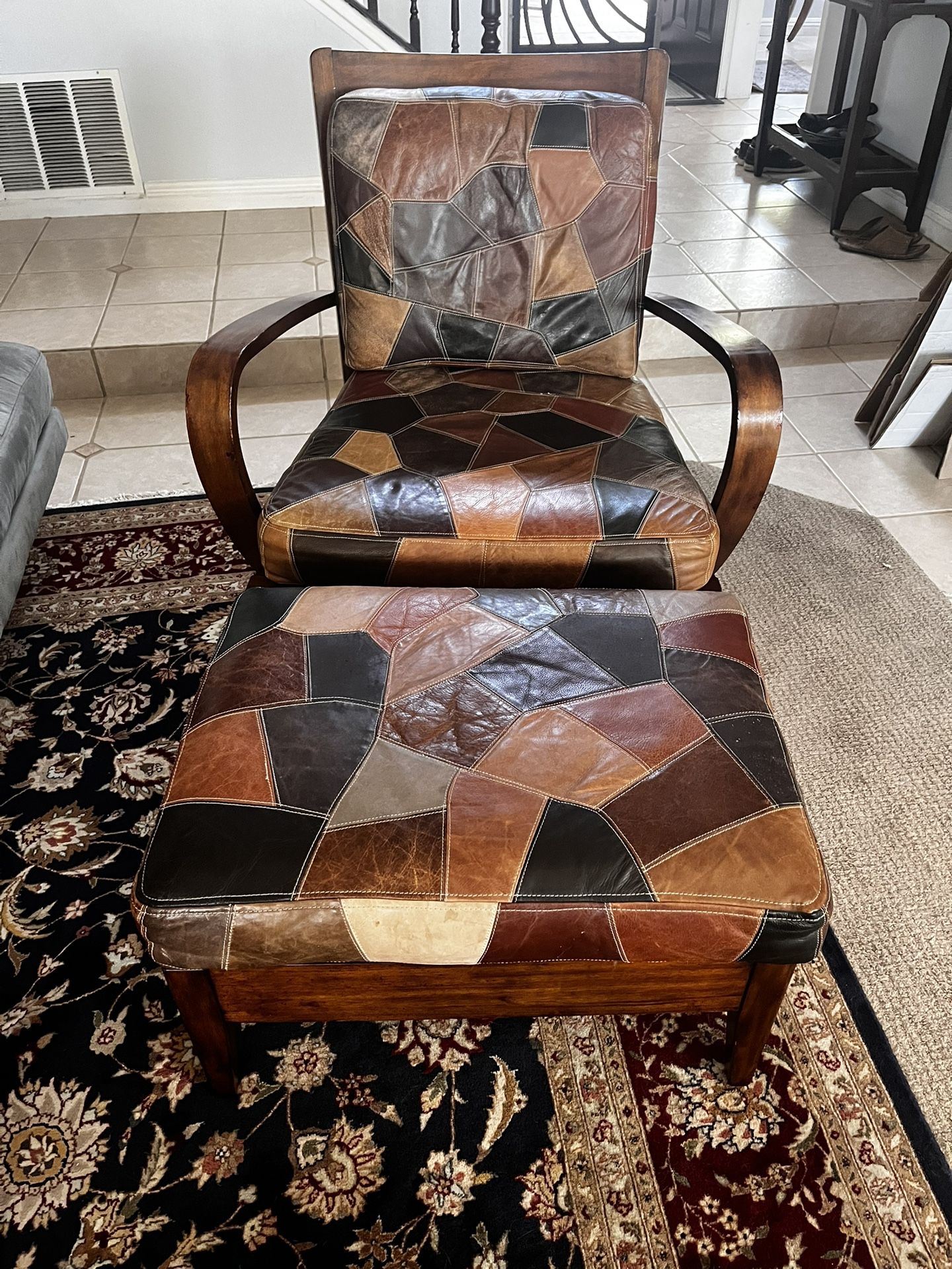 designer leather chair with ottoman