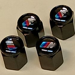 VMW  M Valve Stem Cap 4 pc. Black. item 3122.