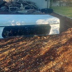 Truck tp camper topper 96inx50in is on a 90s c1500..fits other 8ft truck beds came off a ford