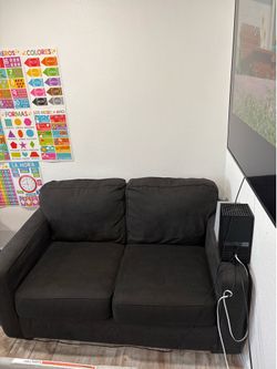 Dark grey couch.