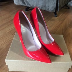 Red pointy heels 
