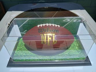 Autographed by Reggie Doss in case