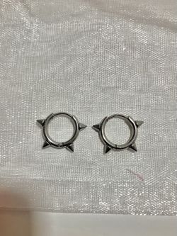 emo 2000s or goth silver spike hoop earings