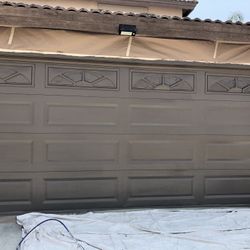Garage doors painted I could make them look brand new with affordable price