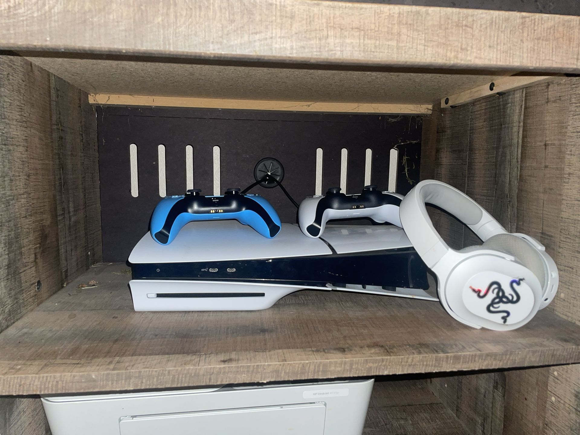 PS5 With Two Controllers And A Headset