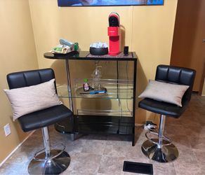 Home bar with two chairs.