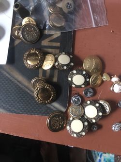 Assorted metal based antique buttons