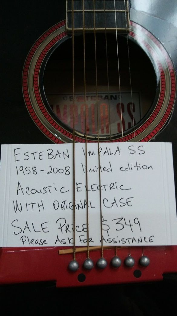 Impalla as acoustic. Electric. Guitar