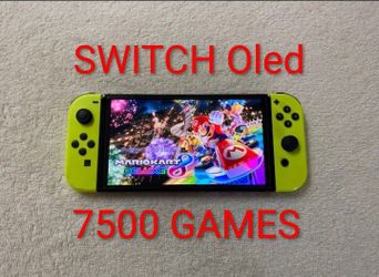NINTENDO SWITCH OLED with 125 Switch Games and 7500 Retro Games