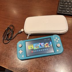 Nintendo Switch Lite with 5 games and case