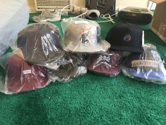 The hundreds and pink dolphin hats