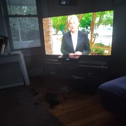 75 smart onn Roku new
