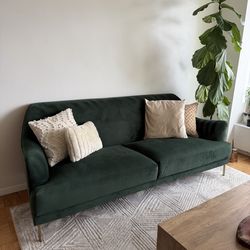Green velvet sofa