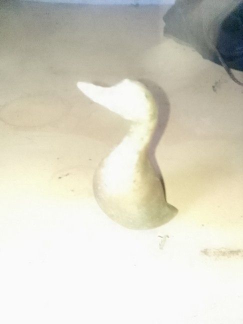 small brass duck