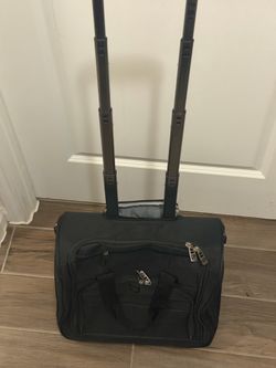 Small overnight bag with wheels and handle