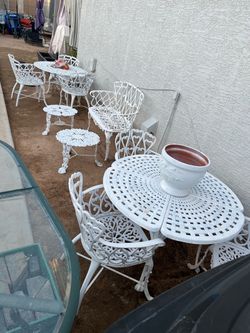 $300 each Patio cast iron furniture sets of 1 table and 3 Chairs, Tables, Plant Pots, small side tables. Benches