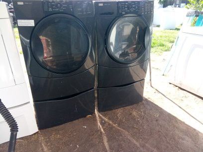 Kenmoore frontloads set washer and dryer both electric with warranty