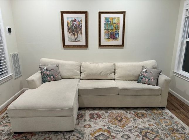 Living spaces : Cream Couch For sale 