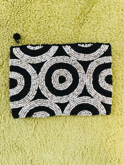 Pretty black and beige hand beaded coin purse/mini clutch