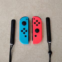 Original Nintendo Switch Joycons controllers with wrist straps