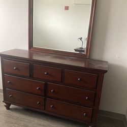 Like new wooden dresser with a mirror MOVING SALE