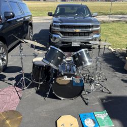Drum Set with Several Symbolsand Accessories