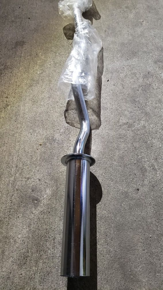 Brand new Olympic curl bar. $40 FIRM.