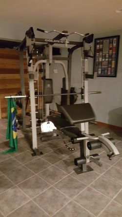 Golds gym platinum complete universal weight machine with extra free bar 2 45 2 35 2 25 4 10 4 5 2 2.5 for Sale in Everett WA OfferUp