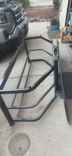 Metal TV stand with glass shelves